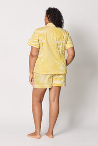 A lady wearing plus size Yellow Short Sleeve Classic Shorty Woven Cotton Sateen Pj Set back view