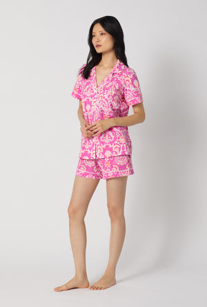 A Lady Wearing Luxe Leopard Short Sleeve Classic Shorty Stretch Jersey Pj Set posing in a side angle look