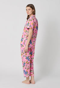 A lady wearing Pink Short Sleeve Classic Woven Cotton Poplin Cropped Pj Set back view