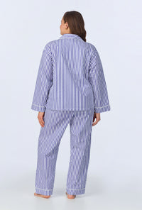 A lady wearing Navy 3D Stripe Long Sleeve Classic Woven Cotton Sateen Long PJ Set