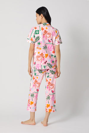 A Lady Wearing Tropical Daydream Short Sleeve Classic Stretch Jersey Cropped Pj Set showing the back view