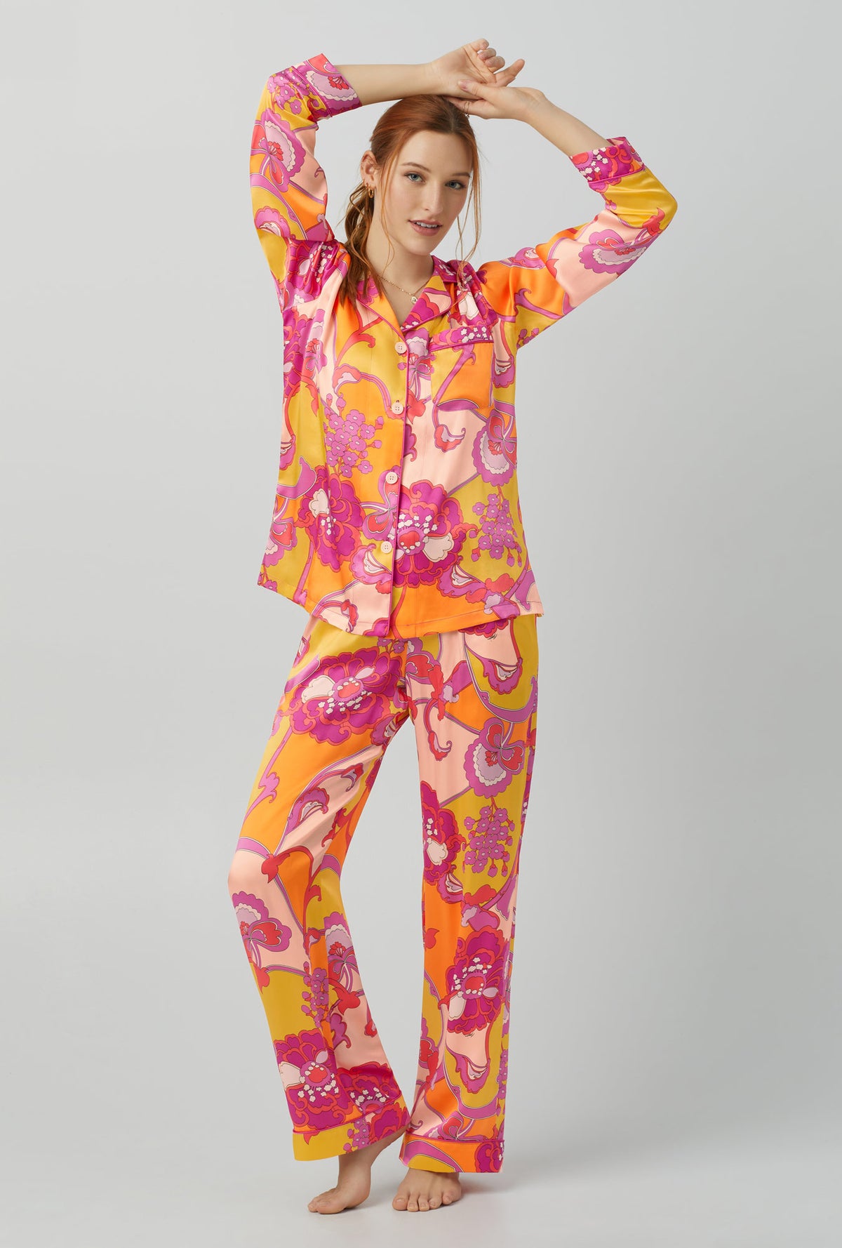 A lady wearing Long Sleeve Classic Washable Silk PJ Set with apache bloom print