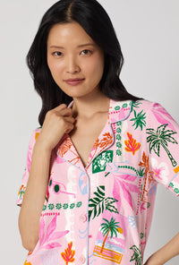 A Lady Wearing Tropical Daydream Short Sleeve Classic Shorty Stretch Jersey Pj Set facing front in a close up shot