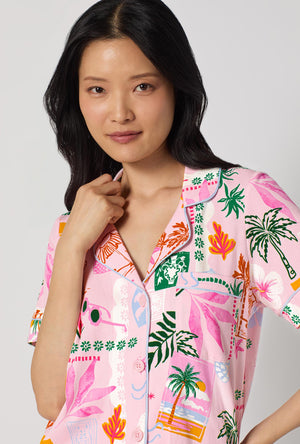 A Lady Wearing Tropical Daydream Short Sleeve Classic Shorty Stretch Jersey Pj Set facing front in a close up shot