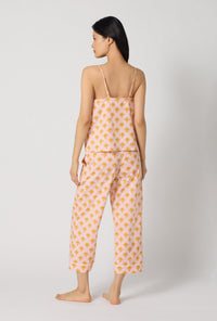 A Lady Wearing Deco Sunset Cami Woven Cotton Poplin Cropped Pj Set posing in a back view look