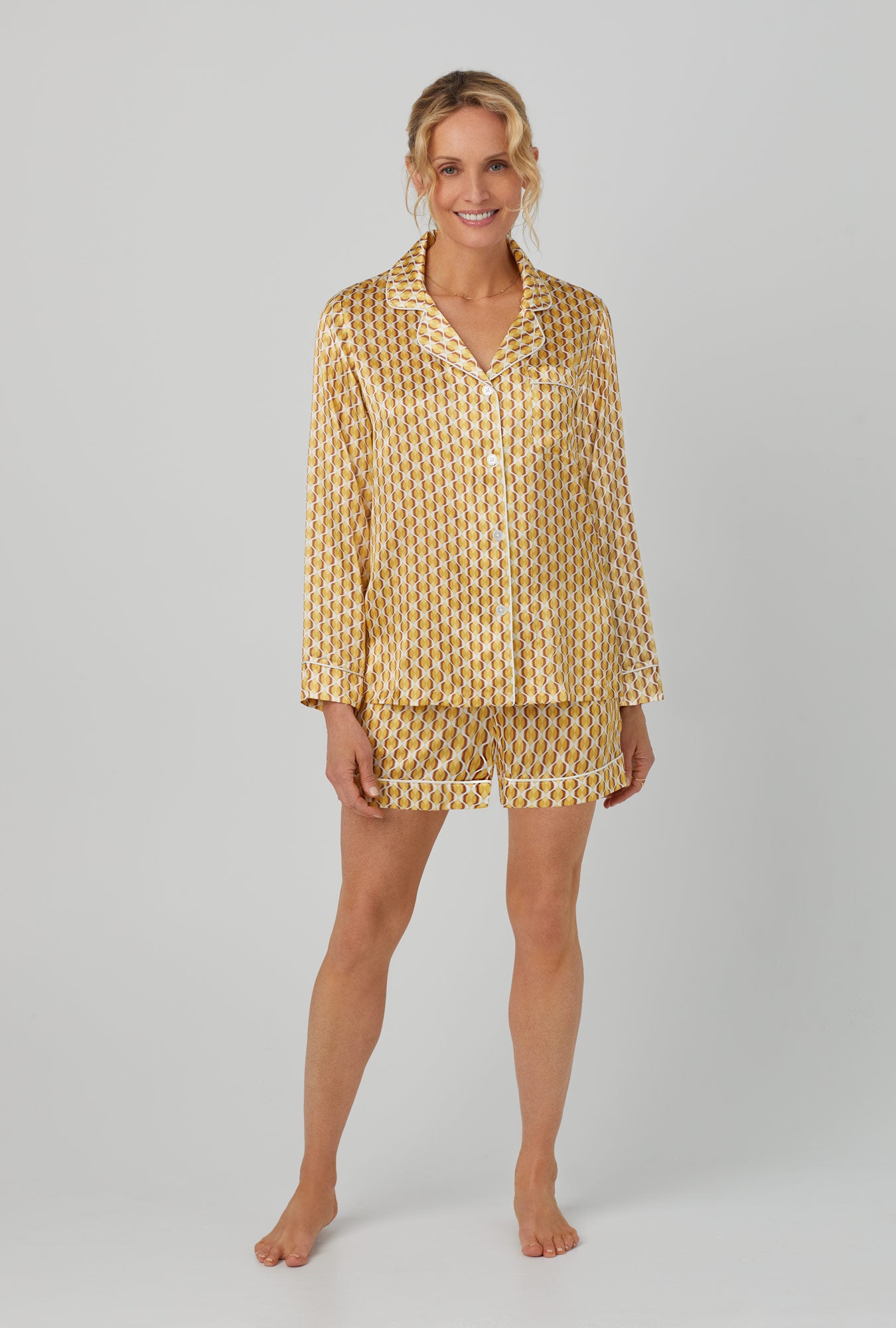 A lady wearing yellow Long Sleeve Classic Washable Silk Satin Shorty PJ Set with Prize Geo print