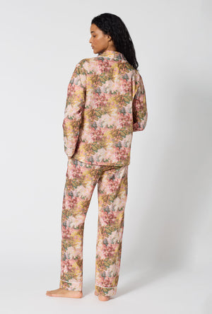 A lady wearing Autumnal Arboretum Long Sleeve Classic Woven Tana Lawn® Pj Set Made With Liberty Fabrics back view