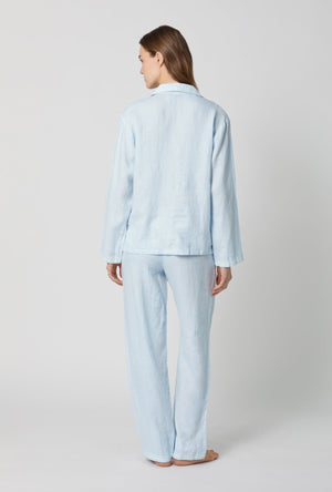 A lady wearing Baby's Breath Blue Long Sleeve Classic Woven Linen Pj Set back view