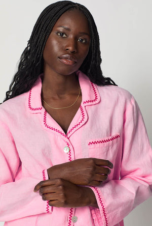 A closeup of A lady wearing Pink Long Sleeve Classic Woven Linen Pj Set
