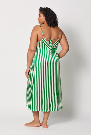 A lady wearing plus size Green and White Woven Washable Silk Chemise back view