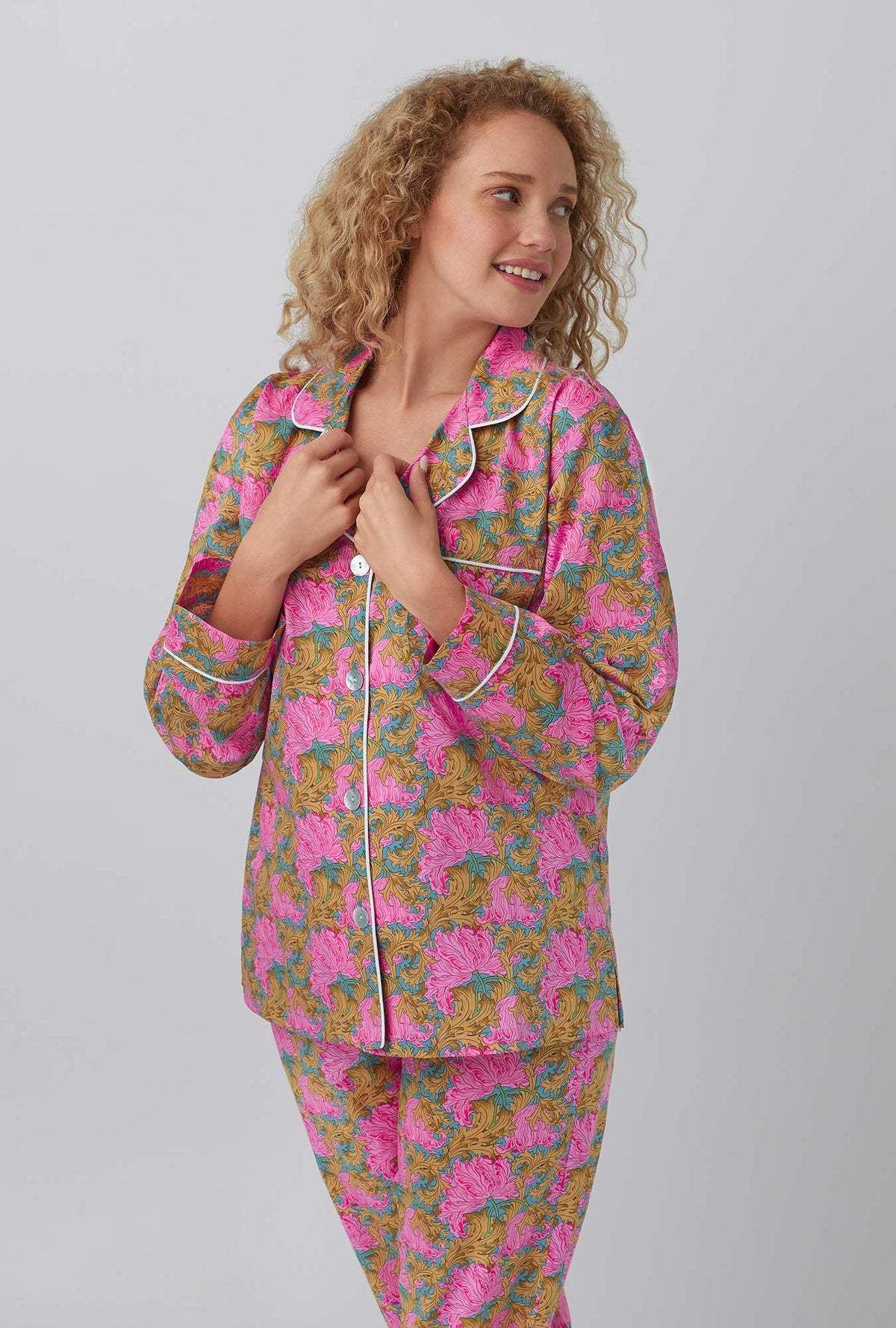 A lady wearing Laura&#39;s Reverie Long Sleeve Classic Woven Cotton Tana Lawn® PJ Set Made with Liberty Fabrics
