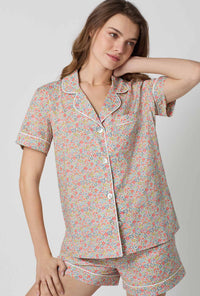 A closeup of A lady wearing Emma & Georgina Short Sleeve Classic Shorty Woven Tana Lawn® PJ Set Made with Liberty Fabric