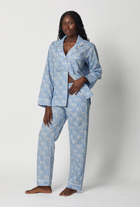 A lady wearing Blue Long Sleeve Classic Woven Tana Lawn® Pj Set Made With Liberty Fabric front view