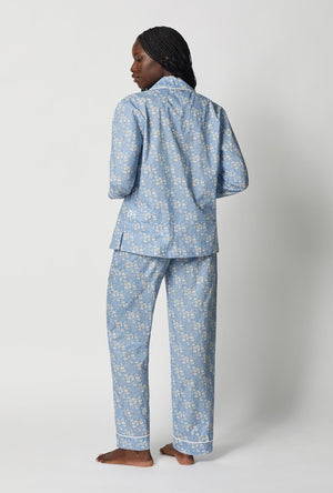 A lady wearing Blue Long Sleeve Classic Woven Tana Lawn® Pj Set Made With Liberty Fabric back view