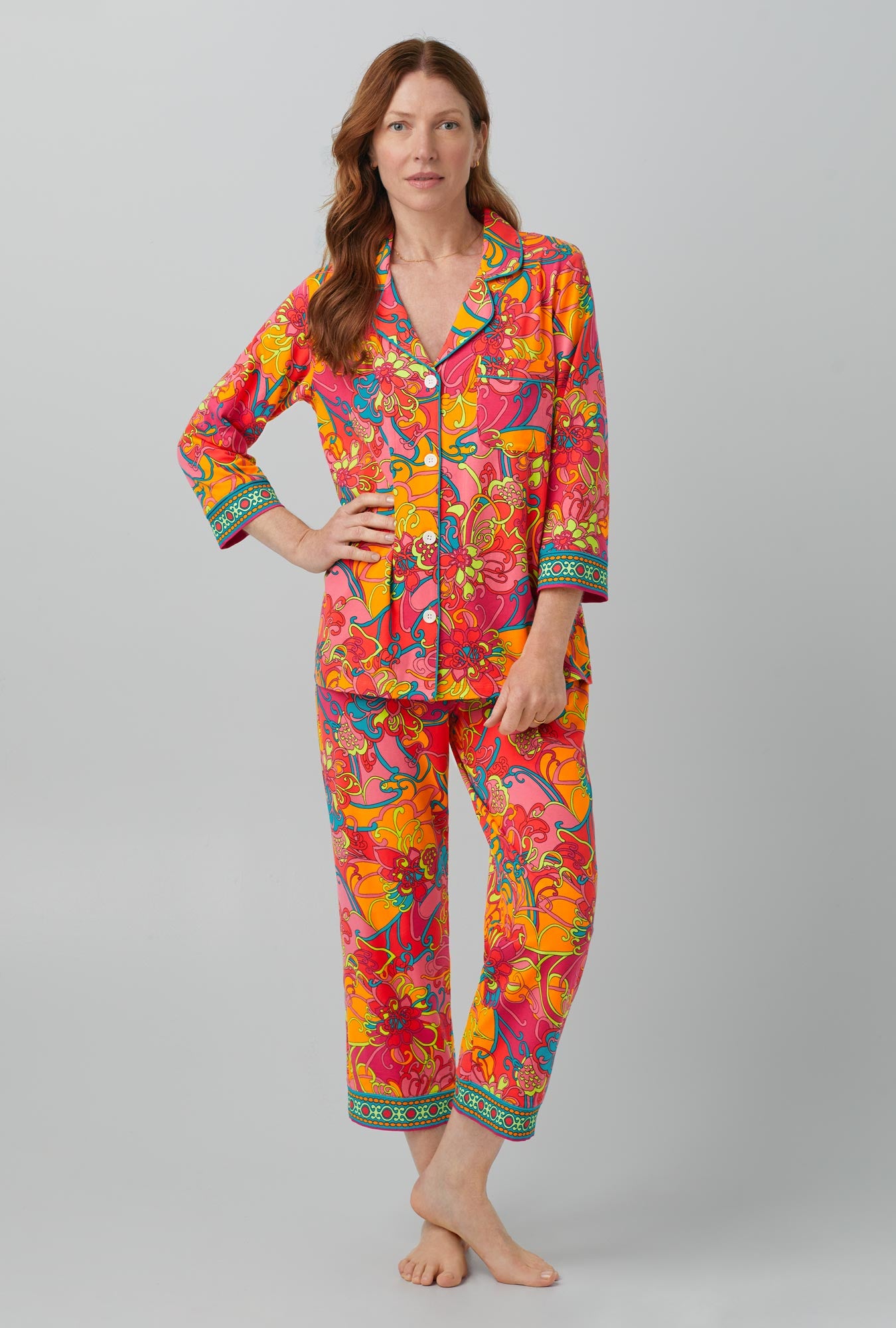 A lady wearing 3/4 Sleeve Classic Stretch Jersey Cropped PJ Set with Turk Madagasca print