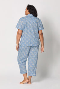 A lady wearing plus size Blue Short Sleeve Classic Woven Tana Lawn® Cropped Pj Set Made With Liberty Fabric back view
