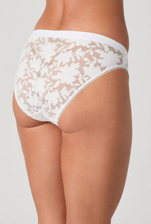 A lady wearing White Stretch Lace Bikini Underwear