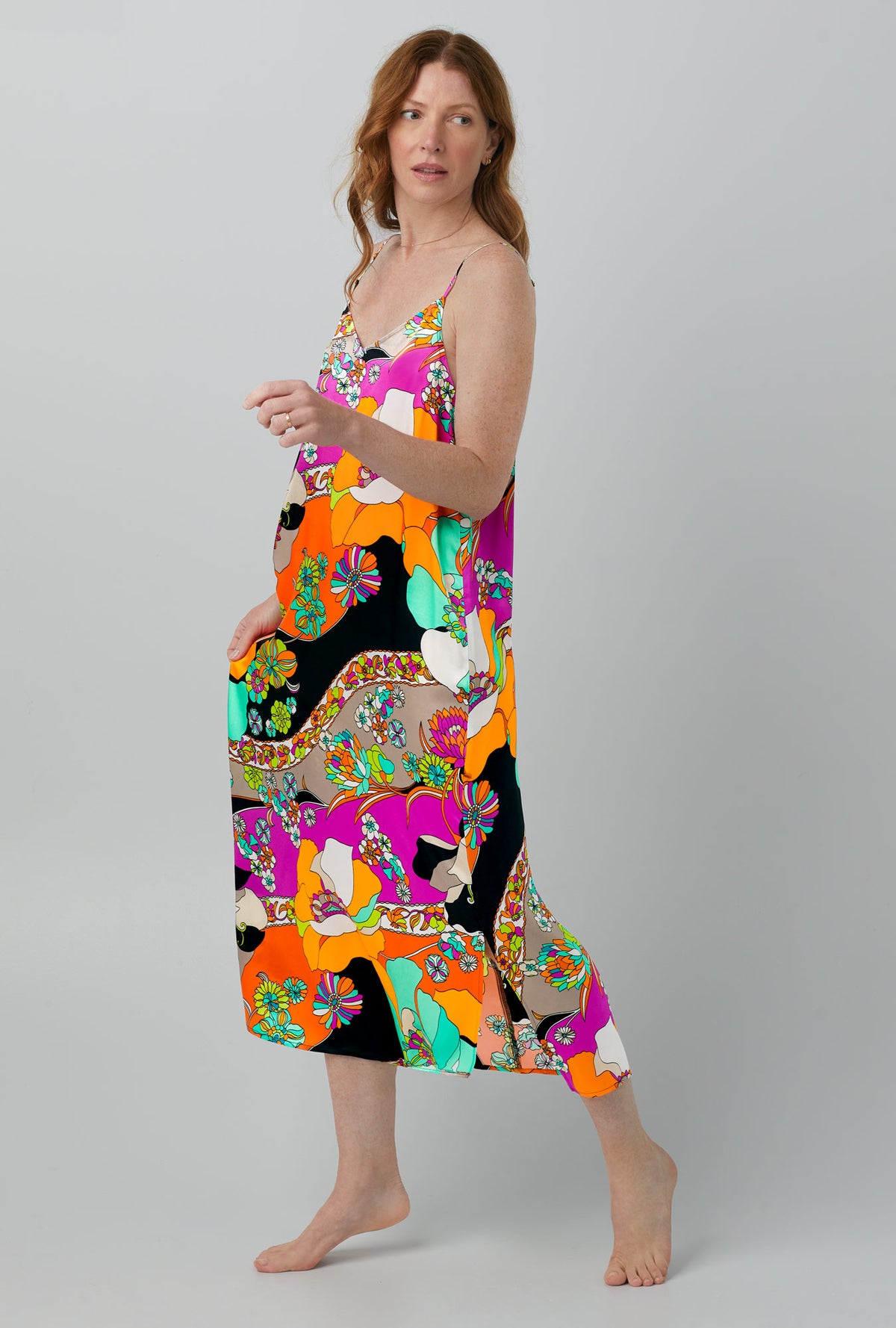 A lady wearing sleeveless Washable Silk Chemise with Skipper Swirl  print