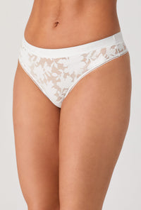 A lady wearing White Stretch Lace Thong Underwear