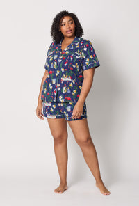 A lady wearing plus size Alice's Adventures Short Sleeve Classic Shorty Stretch Jersey Pj Set
