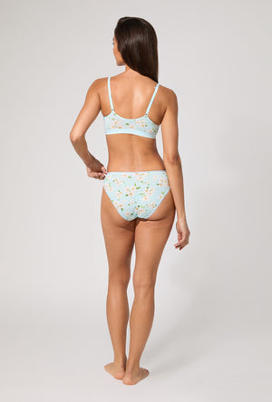 A lady wearing Magnolia Breeze Stretch Jersey Bralette