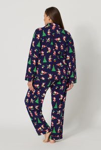 A lady wearing plus size Santa's Night Out Long Sleeve Classic Stretch Jersey Pj Set back view