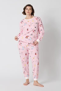 A Lady Wearing Plus Size J'adore Paris Long Sleeve Pullover Crew And Jogger Stretch Jersey Pj Set