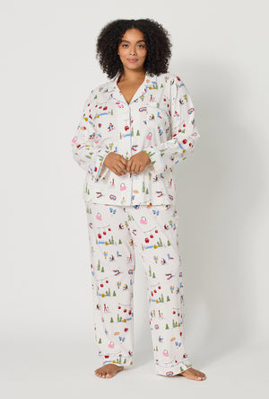 A lady wearing plus size Snow Much Fun Long Sleeve Classic Stretch Jersey Pj Set