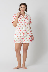 A Lady Wearing Plus Size Celeste Short Sleeve Classic Woven Supersoft Cotton Poplin Shorty Pj Set in a front faced standing pose