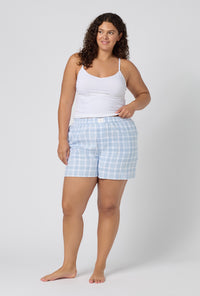 A lady wearing plus size Meadow Haze Plaid Woven Portuguese Flannel Boxer Short