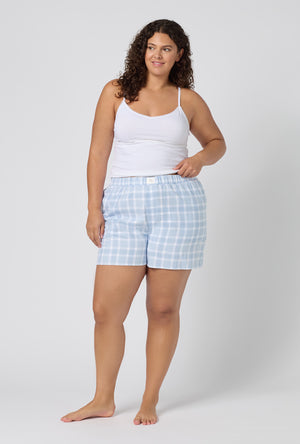 A lady wearing plus size Meadow Haze Plaid Woven Portuguese Flannel Boxer Short