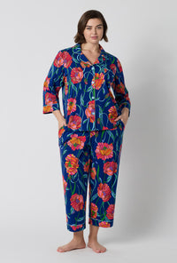 A Lady Wearing Plus Size BedHead x Trina Turk Linear Poppy 3/4 Sleeve Classic Stretch Jersey Cropped Pj Set