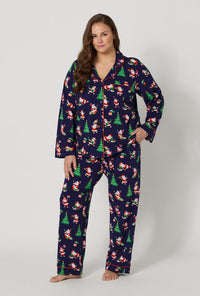 A lady wearing plus size Santa's Night Out Long Sleeve Classic Stretch Jersey Pj Set