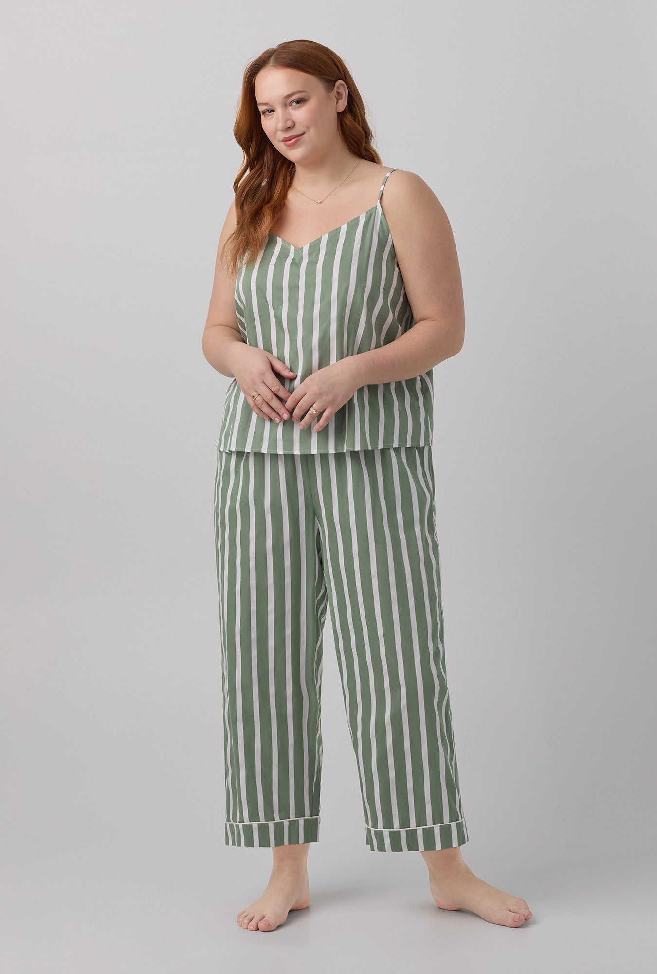 A lady wearing green Woven Cotton Sateen Cropped PJ Set with North Shore Stripe print.