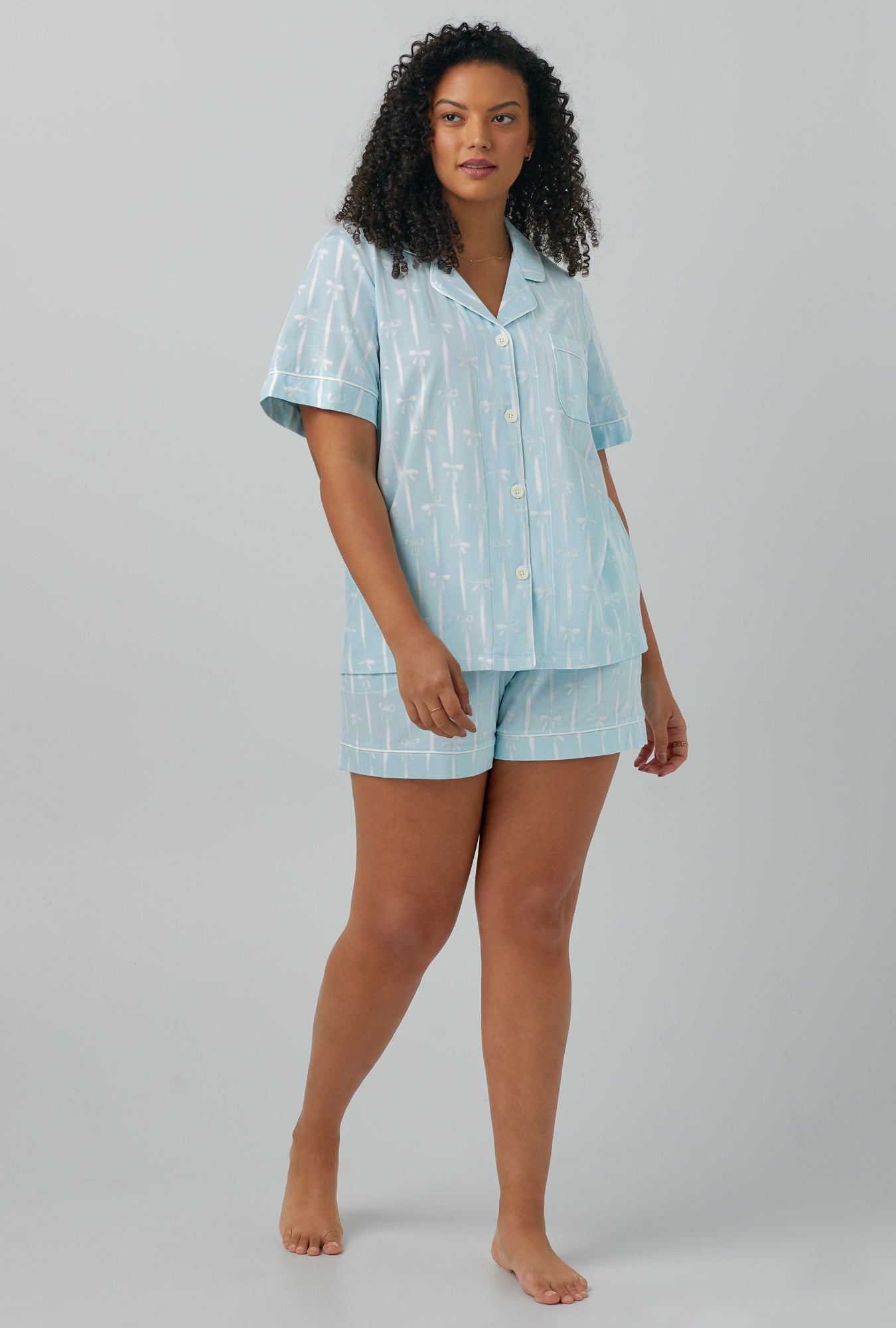 A lady wearing Short Sleeve Classic Shorty Stretch Jersey PJ Set with tying the knot print