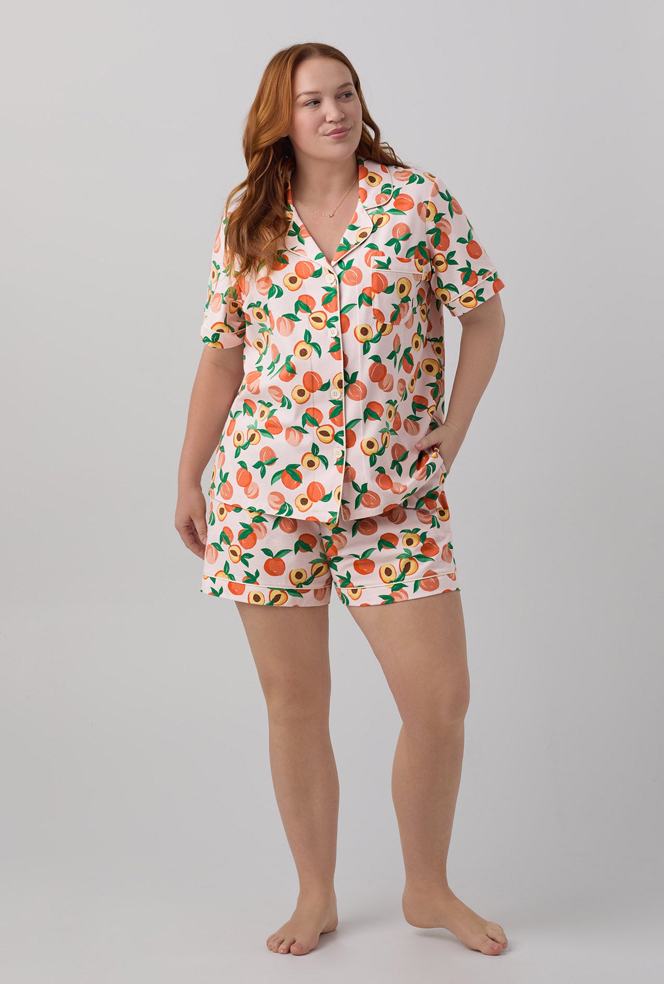 A lady wearing Short Sleeve Classic Shorty Stretch Jersey PJ Set with Peachy Keen print
