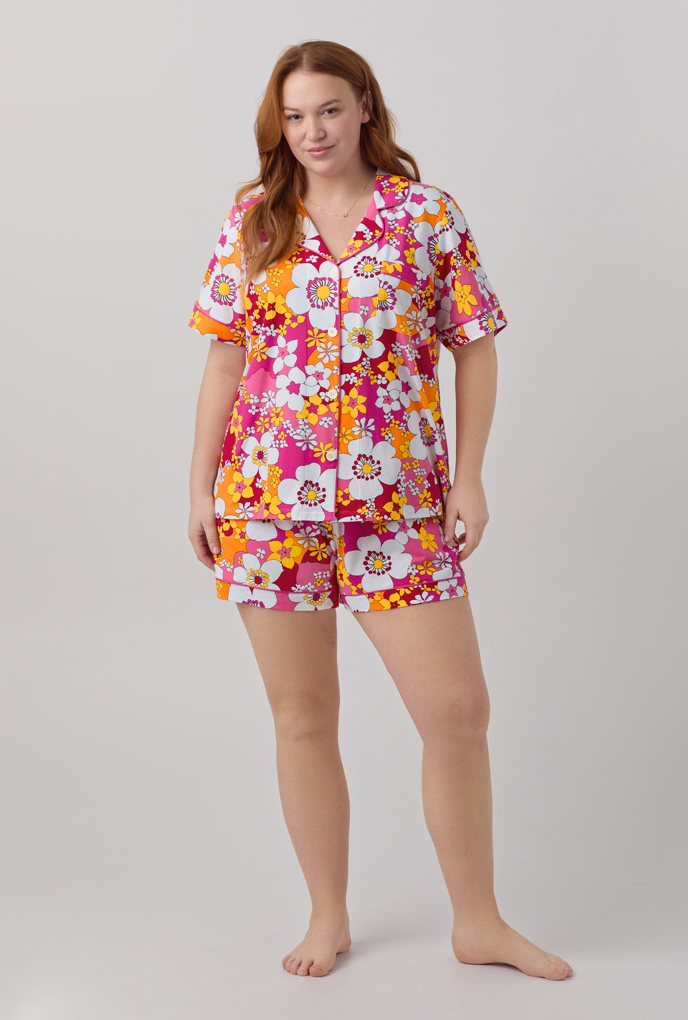 A lady wearing short sleeve classic shorty stretch jersey pj set with bali pink floral print