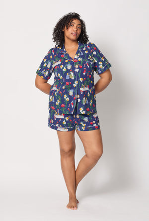A lady wearing plus size Alice's Adventures Short Sleeve Classic Shorty Stretch Jersey Pj Set