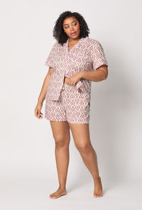 A lady wearing plus size Olivia Short Sleeve Classic Woven Cotton Poplin Shorty Pj Set