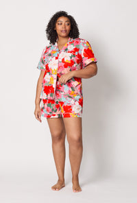 A lady wearing plus size Cassandra Short Sleeve Classic Woven Cotton Poplin Shorty Pj Set