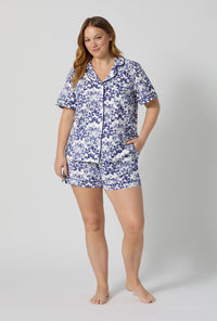 A lady wearing plus size Under The Sea Short Sleeve Classic Shorty Stretch Jersey Pj Set