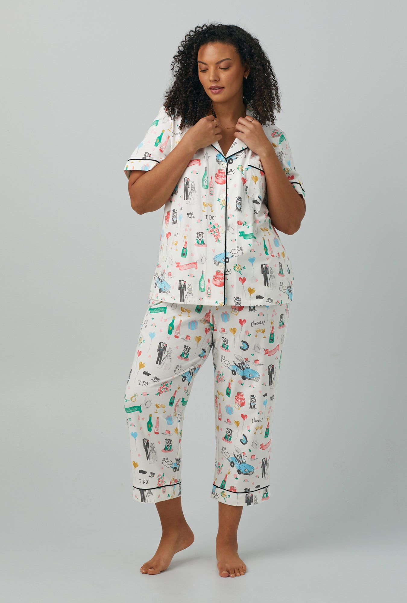 A lady wearing Short Sleeve Classic Stretch Jersey Cropped PJ Set with just married print