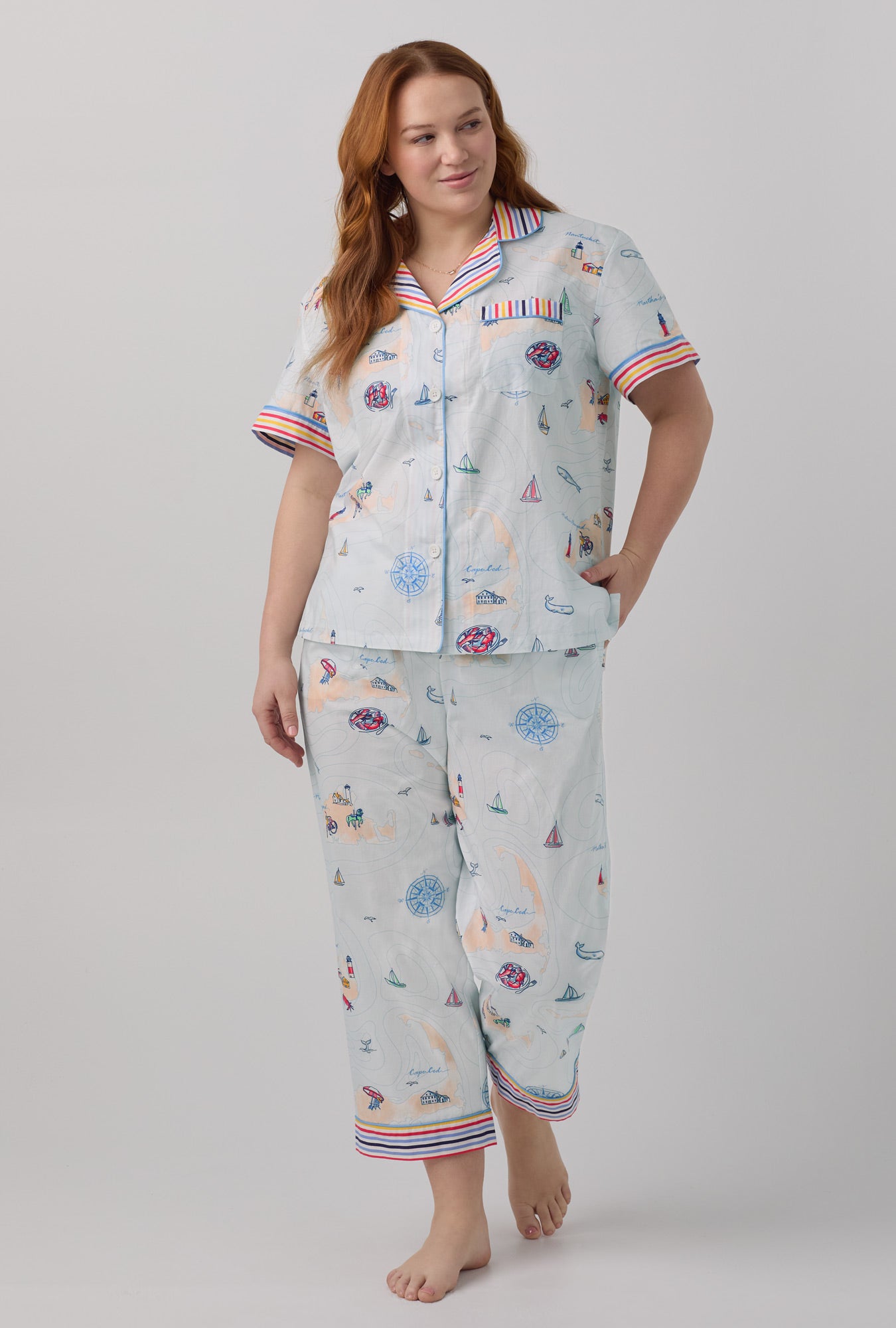 A lady wearing white short sleeve Classic Woven Cotton Poplin Cropped PJ Set with Eastern Seaboard print.