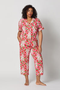 A lady wearing plus size Spring Berry Short Sleeve Classic Stretch Jersey Cropped Pj Set