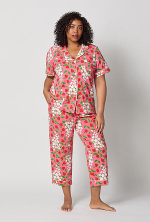 A lady wearing plus size Spring Berry Short Sleeve Classic Stretch Jersey Cropped Pj Set