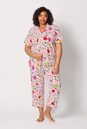 A lady wearing plus size Sunlit Floral Short Sleeve Classic Stretch Jersey Cropped Pj Set