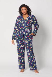 A lady wearing plus size Alice's Adventures Long Sleeve Classic Stretch Jersey Pj Set
