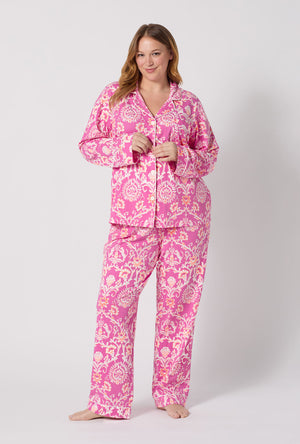 A Lady Wearing Plus Size Luxe Leopard Long Sleeve Classic Stretch Jersey Pj Set posing in a front view look with a smile on her face