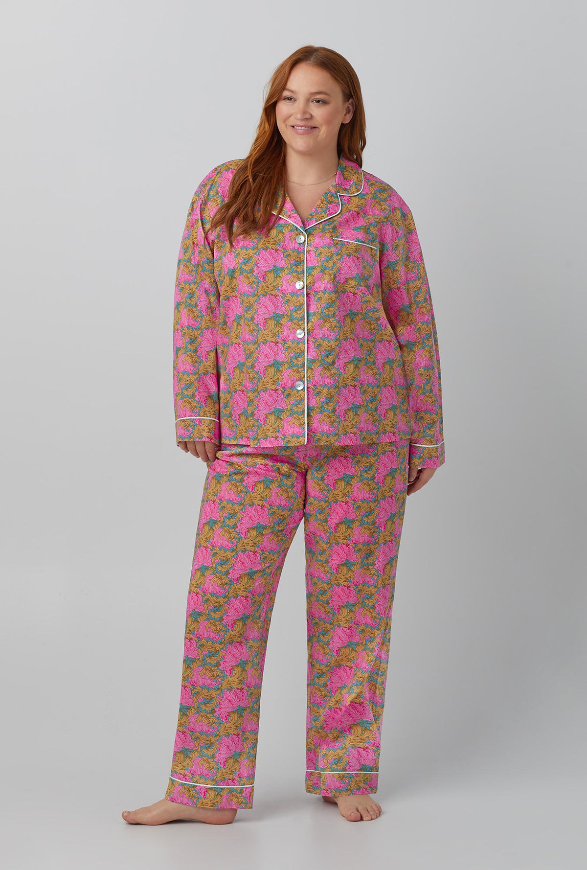 A lady wearing Laura&#39;s Reverie Long Sleeve Classic Woven Cotton Tana Lawn® PJ Set Made with Liberty Fabrics