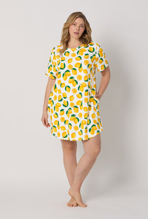 A lady wearing plus size White and Yellow Stretch Jersey T-Shirt Sleep Dress front view